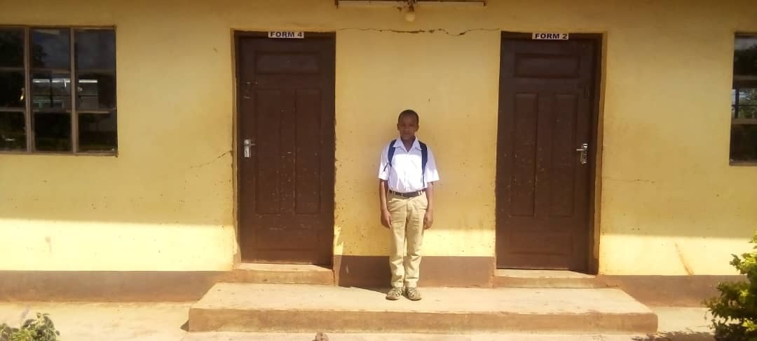 Photo of Anold on his first day of school at Endarofta