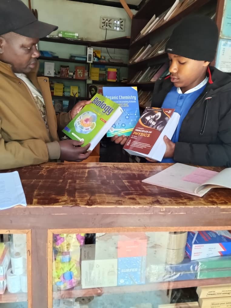 Image of Anold buying schoolbooks
