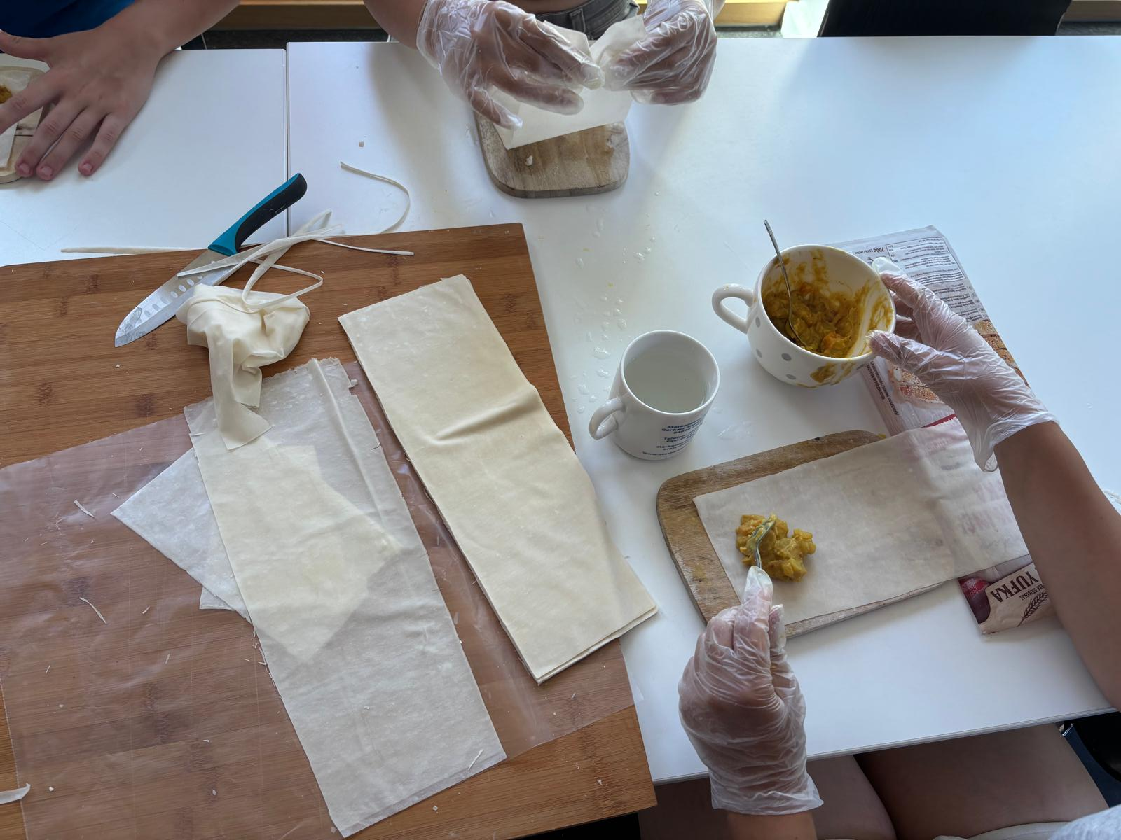 Preparing the samosas Photo of students preparing the samosas